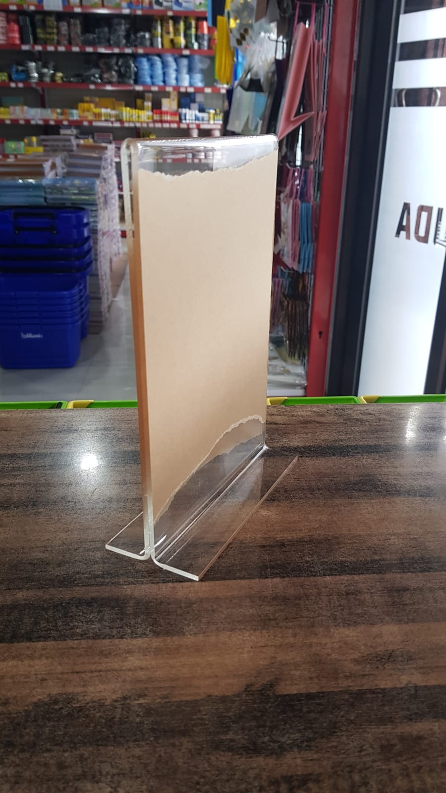Akrilik tempat brosur dan QRIS Ukurang A5
