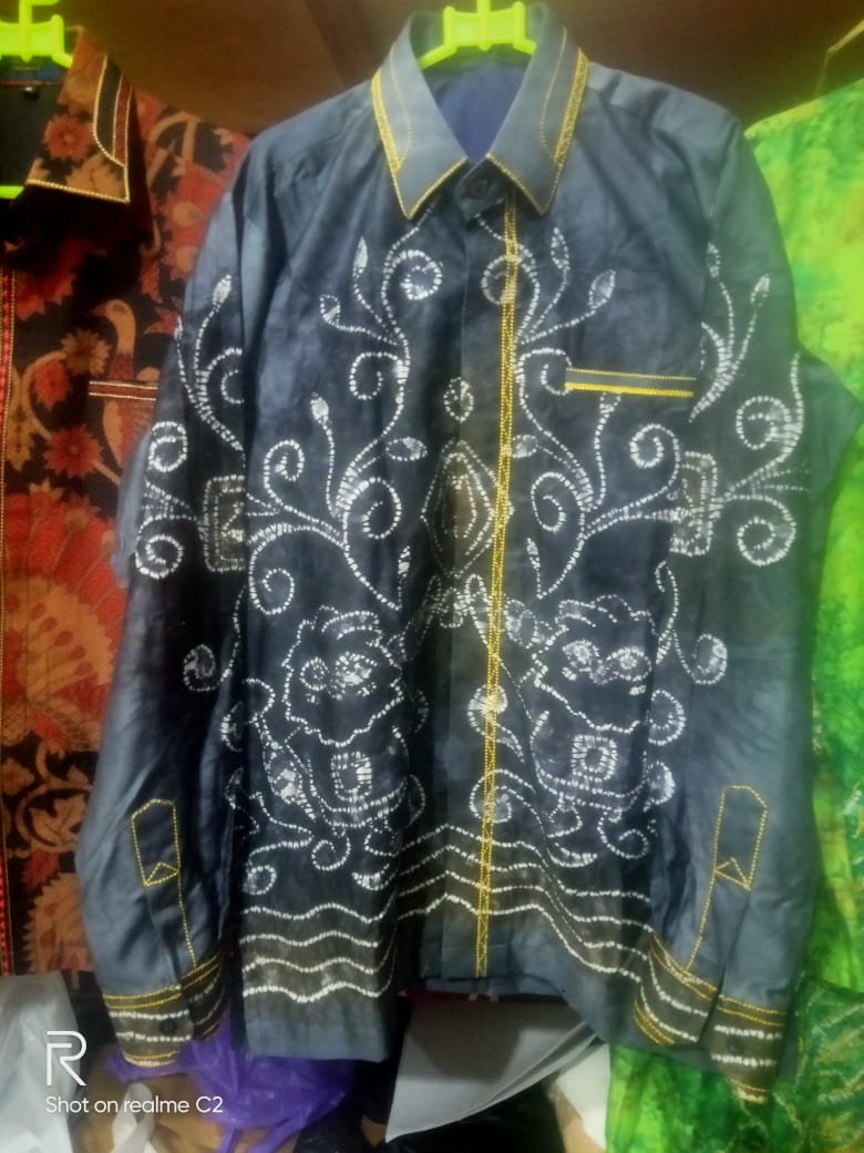 menjahit baju sasirangan 